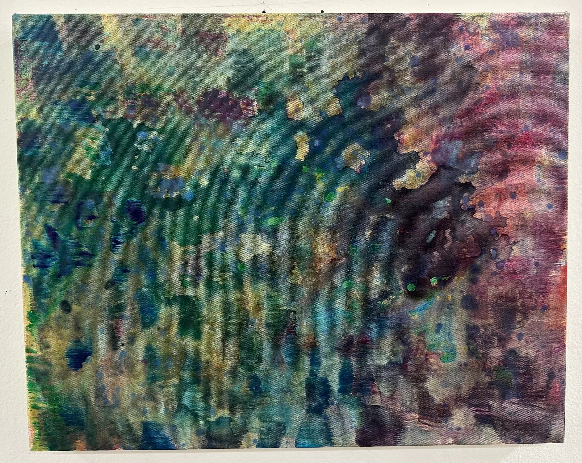 An abstract painting with green on the left, purple on the right, with a loosely checkered pattern throughout.