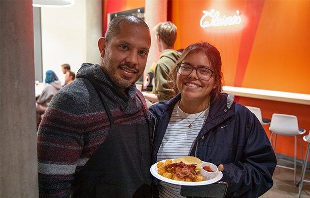 Negrete with an Otis College student during Moonlight Breakfast in 2019.