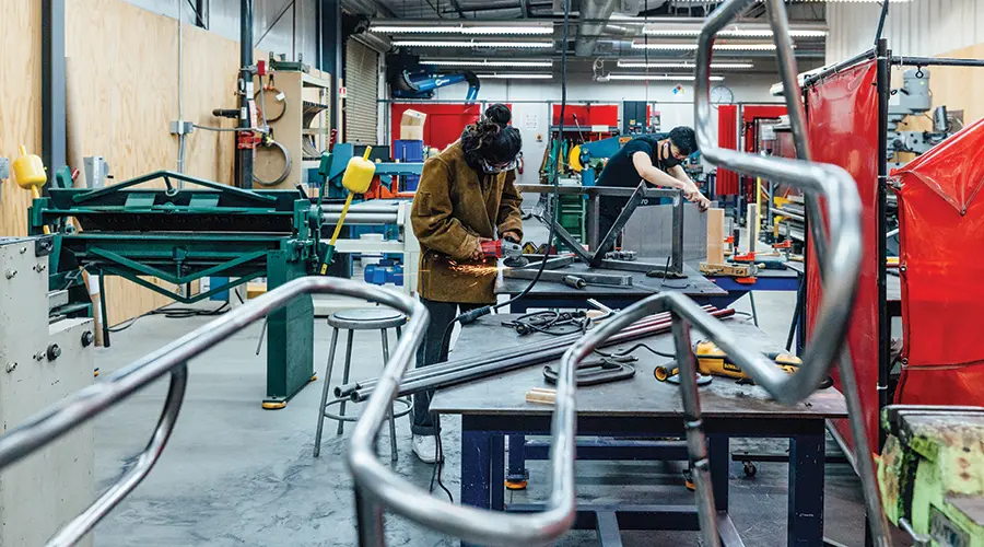 Students working in Wood and Metal shop