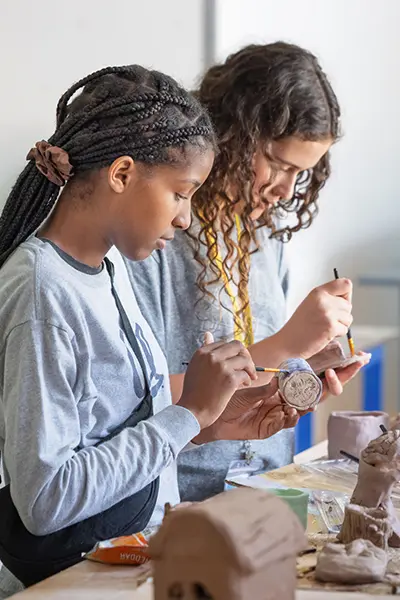 Young students working on cermaics