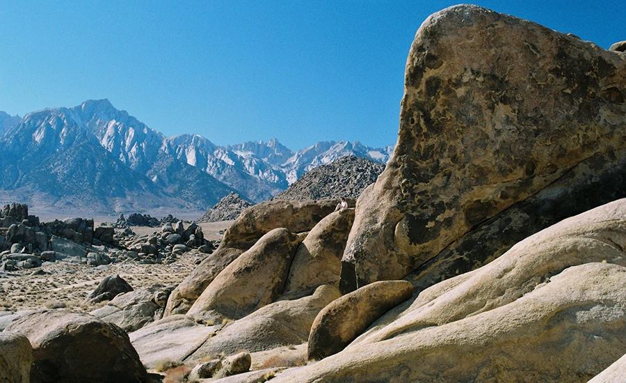 Photo of mountains in the desert by Ian James