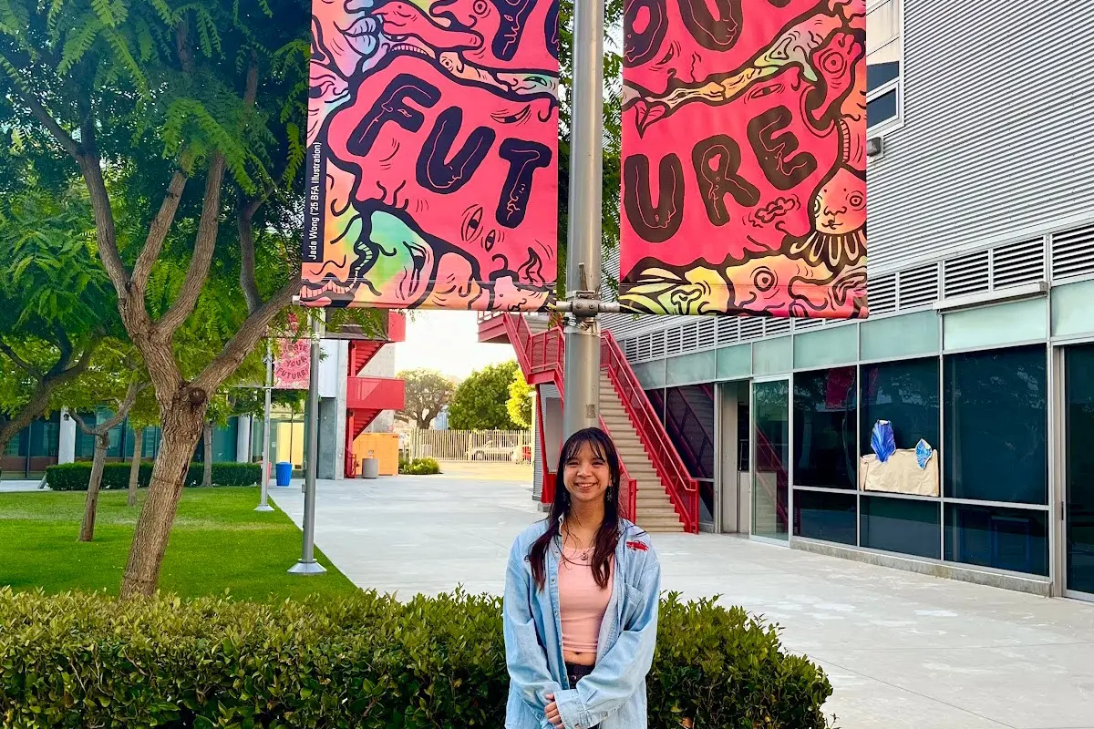 Jada Wong with Pole Banners on Otis College campus