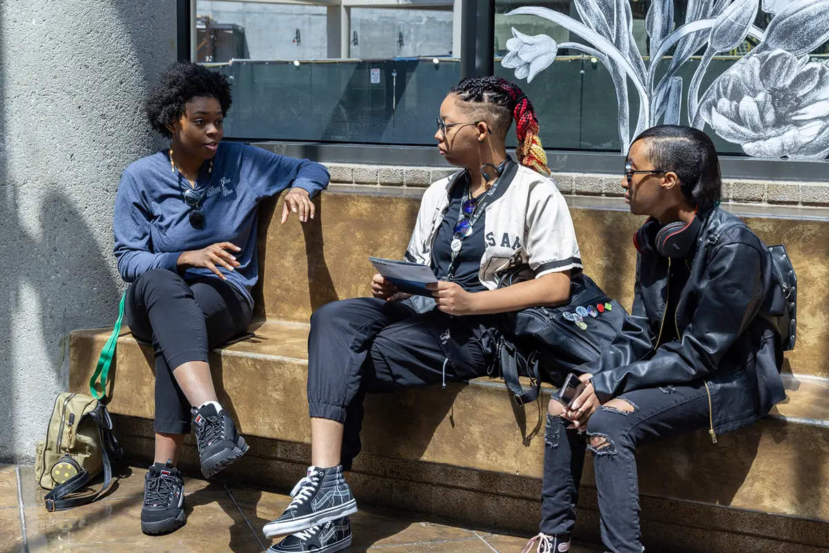 An Otis College peer advisor speaks with Black Creatives Institute participants during a field trip last summer. Photograph by Jennifer Atalla/Otis College of Art and Design. 