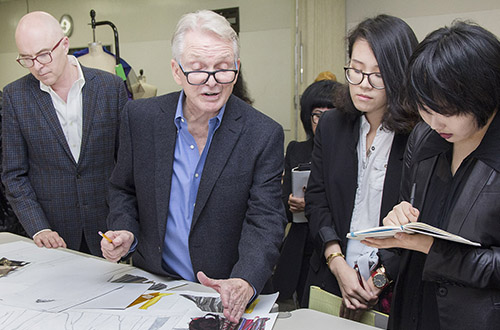 Bob Mackie, center, mentoring Otis Fashion Design students. 