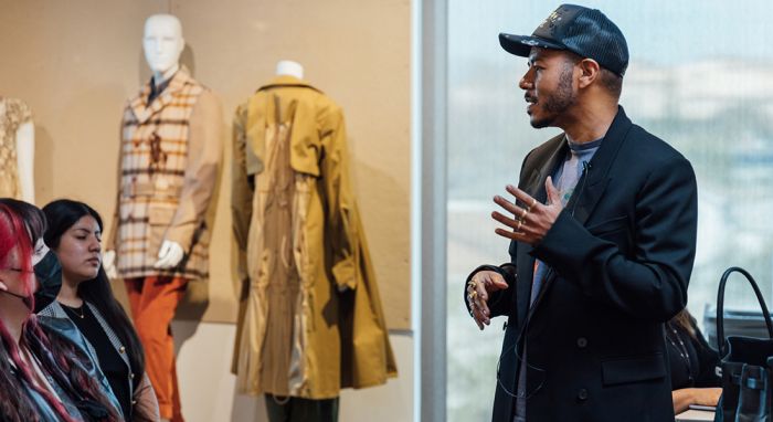 Otis College Trustee Leonardo Lawson addresses Fashion Design students during his mentorship