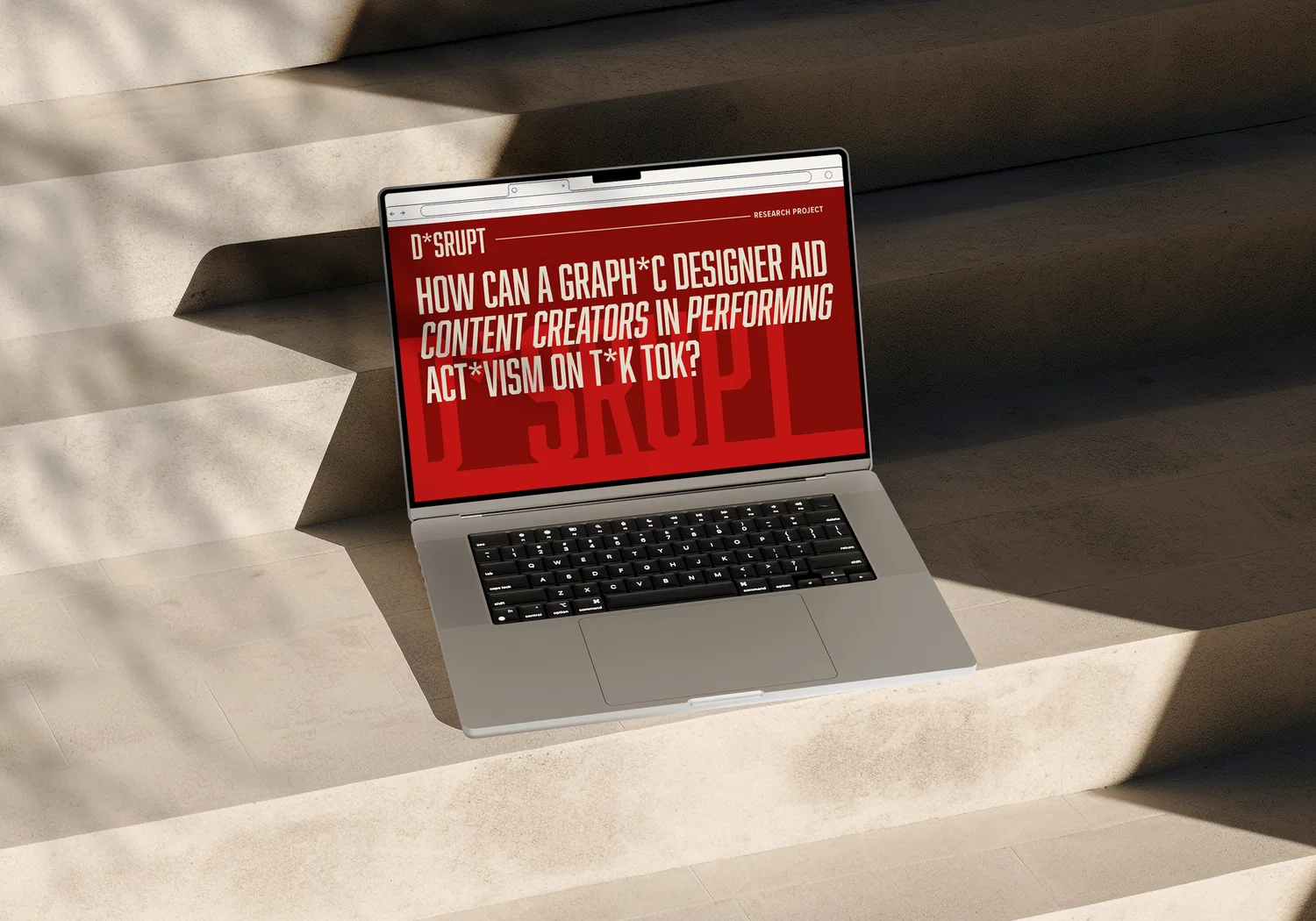 Laptop that shows a website with the title "how can a graphic designer aid content creators in performing activism online?"