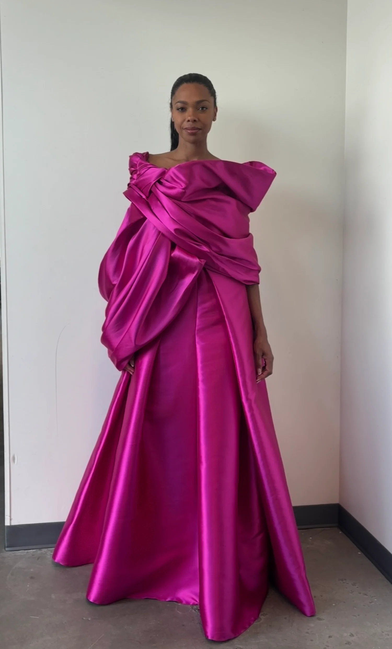This gown was created with the idea of combining inspiration from vintage and modern. I was able to fully design, pattern, drape and sew the gown during my final semester at Otis. This was for mentor David Meister; with the direction being a focus on bold color and drape, without fabric treatment. The inside of the gown is couture -level finished with corsetry and hand stitching techniques.