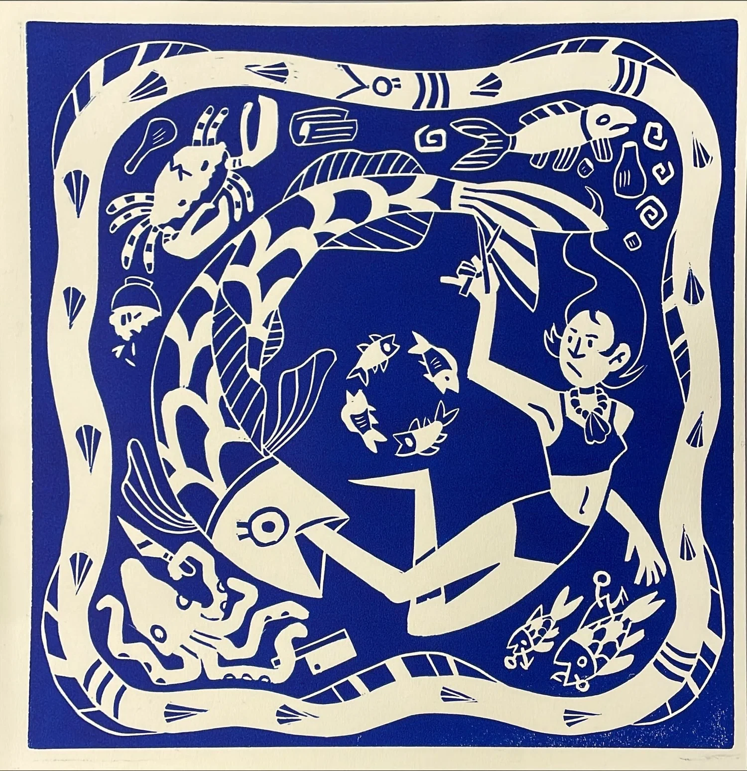 A fish-themed linocut print.