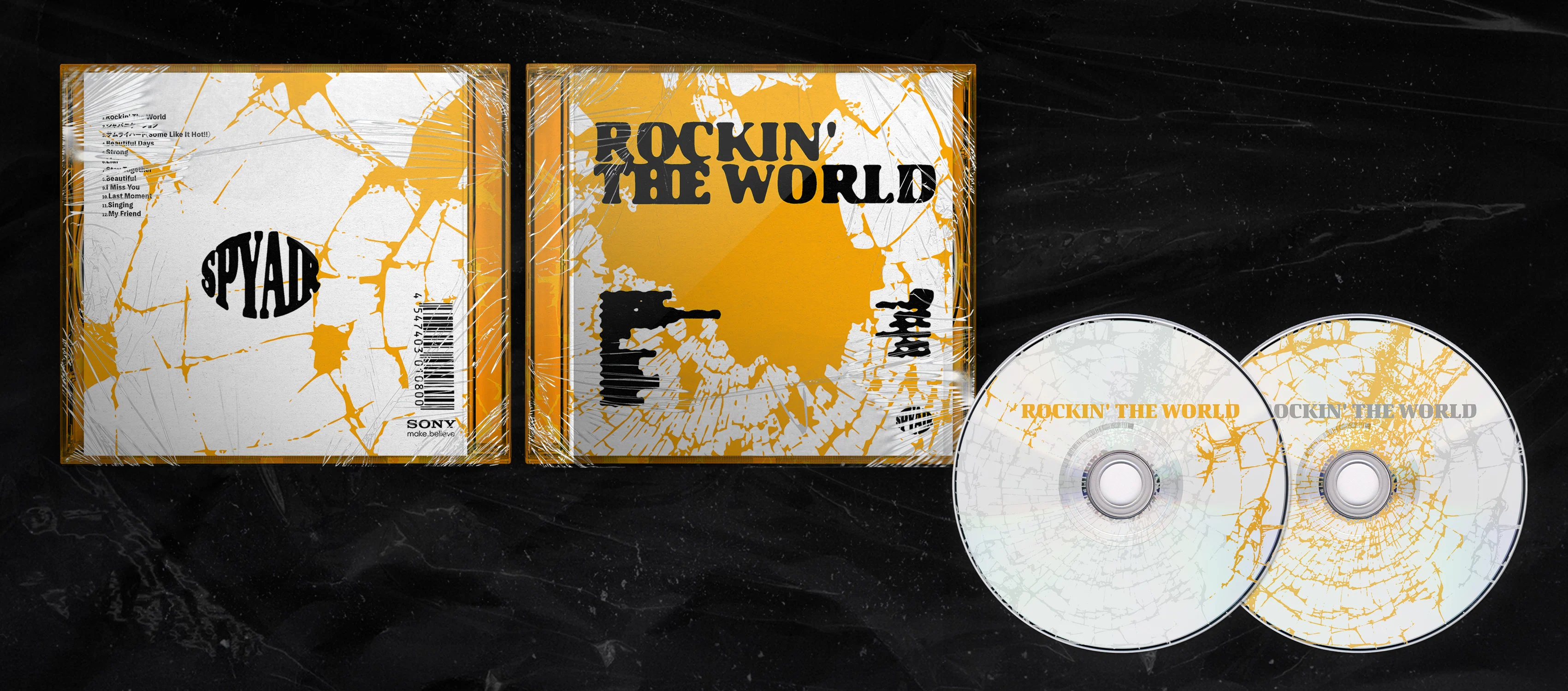 Album cover design featuring a fractured glass effect, with sharp shards spreading across the composition. The broken surface creates a sense of movement and tension, visually suggesting impact and energy.