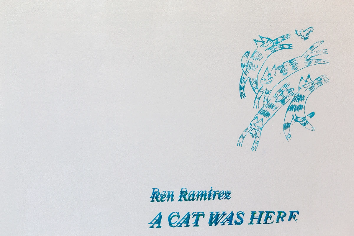 A CAT WAS HERE title wall