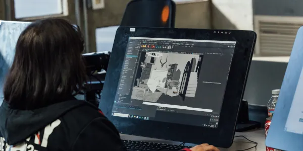 Female student working on a 3d design on a computer