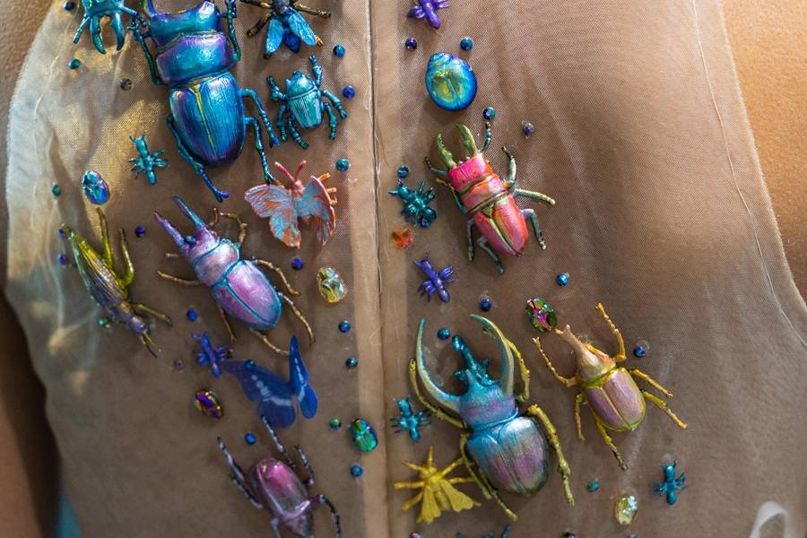Student-designer Soline Gauthier embellished her dress design with multiple decorative beetles.