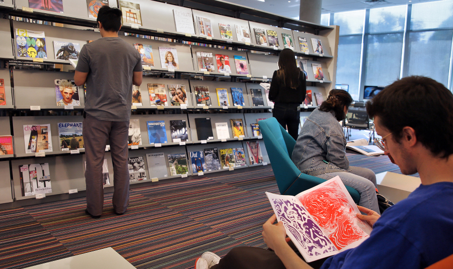 Students reading in the Otis College Library