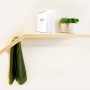 shelf with slanted end for holding a towel